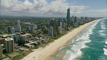 Gold Coast, Queensland. Mansions along canals and skyscrapers, hotels along beach. Surfers Paradise