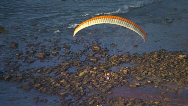 Byron Bay; Lennox Head hang-gliding off cliffs along Pacific Ocean coast.