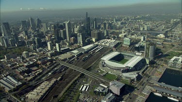 Telstra Dome Melbourne. Sports venue. Stadium. Marina in foreground and city skyline in background.