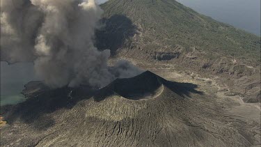 Close up of volcano volcanic vent with smoke rising.