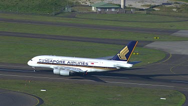 Singapore Airlines Boeing take-off airport runway.