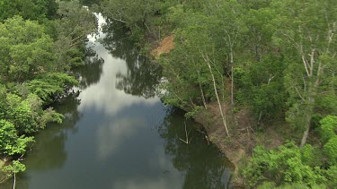 River, Northern Territory. Very green and lush. Reflections of clouds.