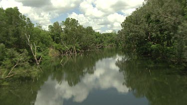 River, Northern Territory. Very green and lush. Reflections of clouds.