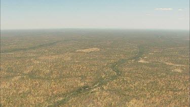 Aerial area around Burketown, Tropical North Queensland. The Gulf Savannah. Far North-western Queensland. Tropical region but quite dry and arid, dry river bed meanders through dry savannah. Gulf of C...