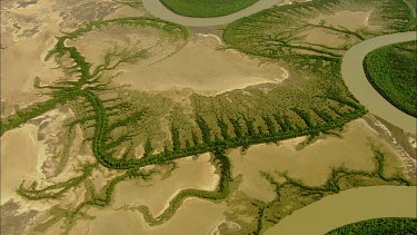 Aerial Meandering river zigzags across landscape.