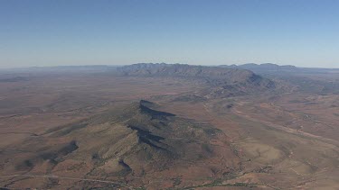 Rocky mountains in the Flinder Ranges against a hazy sky