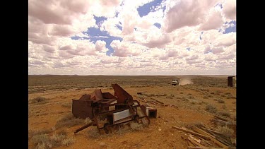 CM0012-BEY-0006852 Jeep driving along desert road