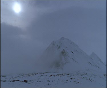 Snow covered rock