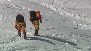 Aerial of Mount Everest: Group of Climbers - Two climbers are still climbing