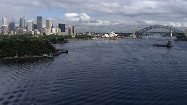 Aerial - Sydney - Port Jackson to Circular Quay - Main Wharfs - Sydney City, Opera house and Harbour Bridge featured