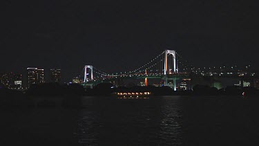 Small boats at anchor near the Rainbow Bridge, Tokyo