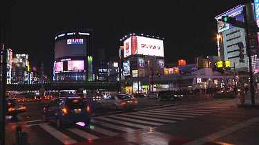 Traffic on a busy intersection in Tokyo, Japan