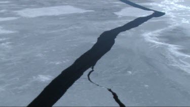 Aerial view of the sea ice on Antarctica breaking up