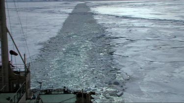 Rear of ship stern, View of a Russian ice-breaker sailing and breaking the ice in the Weddell Sea, Antarctica. Wake of the ship.