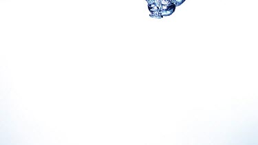 Air injectded into Water against White background, Slow motion