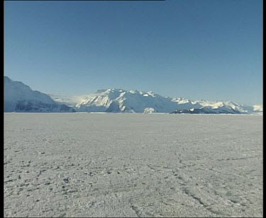 Over ice plain and ice mountain