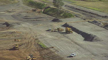 Building construction site, preparing the land. Building the roads. Wide Shot.