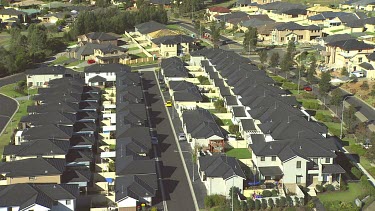 New Housing estate, suburbs. City's fringe. "MacMansions".