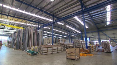 PAN building construction supplies in a warehouse or factory.