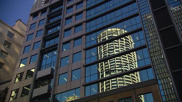 Reflection of building in glass windows (Australia Square).