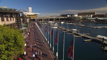 Cockle Bay wharf at Darling Harbour. Marina with berths for yachts. Bars and restaurants on left hand side.