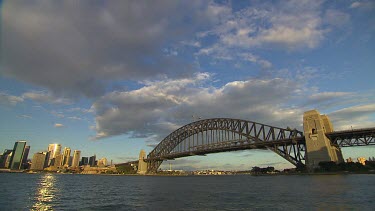 Time  lapse Sydney Harbour Bridge and clouds. North Sydney, Millers Point, Kirribilli. Gentle soft light with clouds.