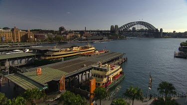 Sydney Circular Quay, Harbour with Harbour Bridge. Museum of Contemporary Art in background and the Rocks.