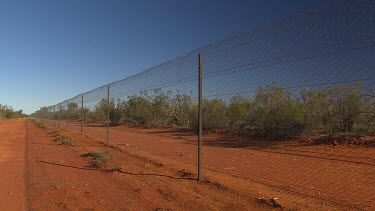 Barbed wire Bilby fence designed to keep out predators (long shot)