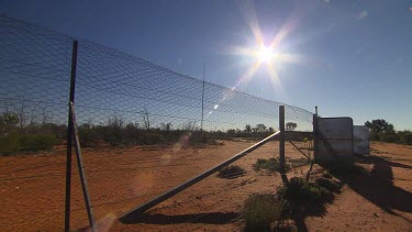 Pan Barbed wire Bilby fence designed to keep out predators (long shot)