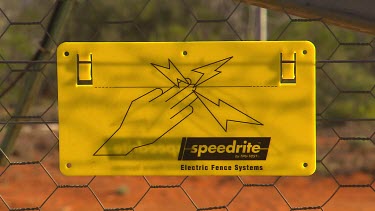 Sign says "electric fence"