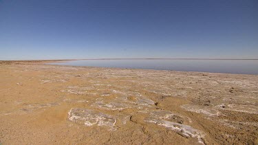 Edge of Lake Eyre shows salt encrusted soil