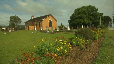 Small church chapel with cemetery. Flower beds. Very calm and picturesque.