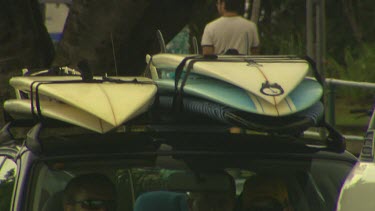 Surf boards on roof of car