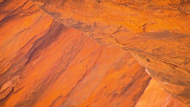 Very red orange yellow rock forming a ridge