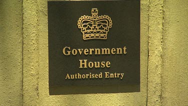 Sign close up  Government House Authorised entry. Emblem symbol of royal crown