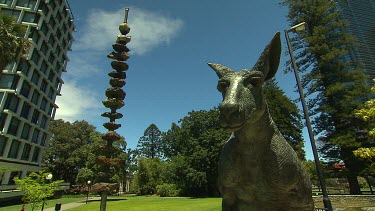 Statue of a Kangaroo sp Red? official government gardens Perth. St Georges Terrace