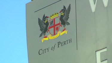 Locked off shot of official coat of arms for city of Perth, two black swans.