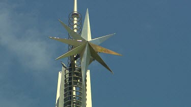 Apex of Bell tower Perth. Low angle close up. Star with eight points. Swan bells.