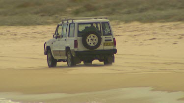Wheels, tyre of 4wd. Four wheel drive driving on beach