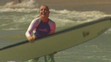 Young woman surfing