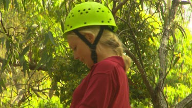 Young woman abseiling
