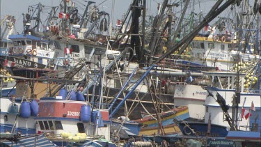 Very busy port in Ilo Peru. Many fishing boats. Crowded