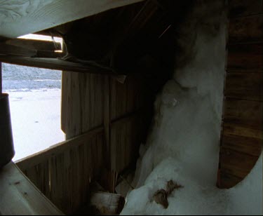 Detail of Mawson's Huts. Cape Denison Commonwealth Bay. Australian Antarctic Territory. Ice has invaded the hut, and is threatening the conservation of the structure. Interior