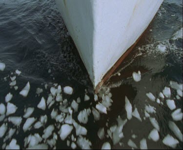 Prow of ship ice-breaker breaking through ice.