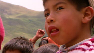 Peruvian school child eating