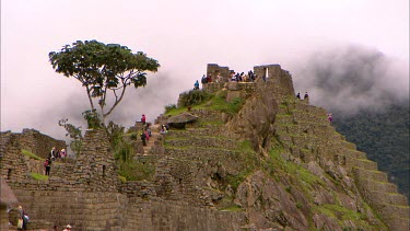Tourists exploring Machu Piccu