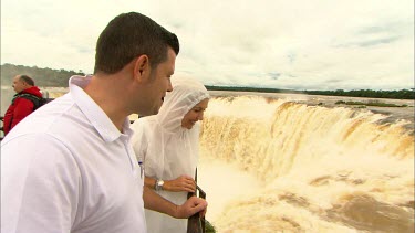 Catriona Rowntree and guidelooking over the Iguaz Falls