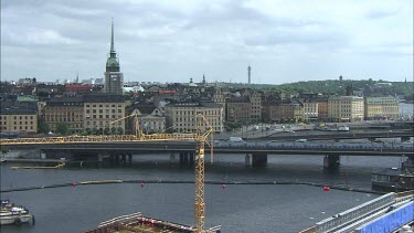 Traffic in the centre of Stockholm, The Old Town in the background.