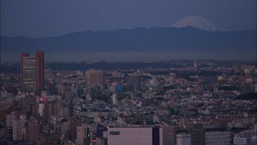 Panoramic  view of Tokyo at dusk/dawn, filmed from a hight.