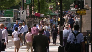 Fast forward of a busy crosswalk in USA